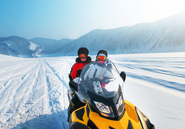 Couple on Snowmobile