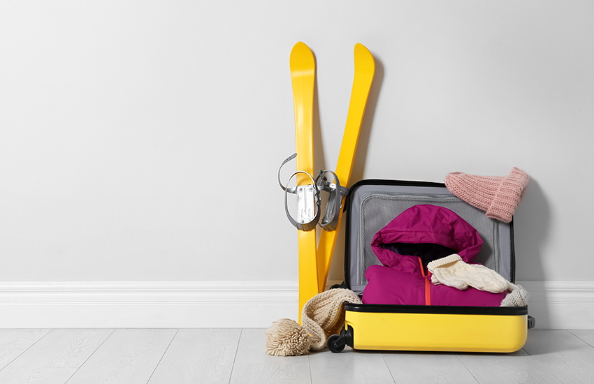 The beginner ski packing list for a ski trip using Ship Skis